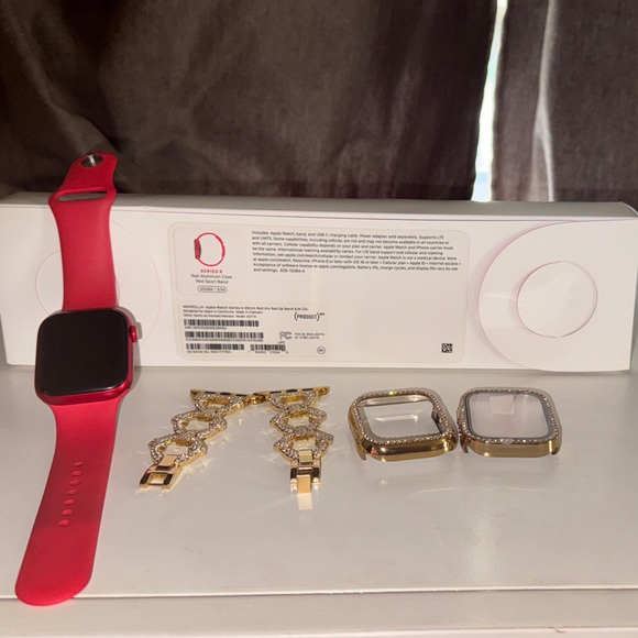 Sleek Red Smartwatch with Gold Trim
Apple Watch 8 series with extra band - Picture 1 of 3
